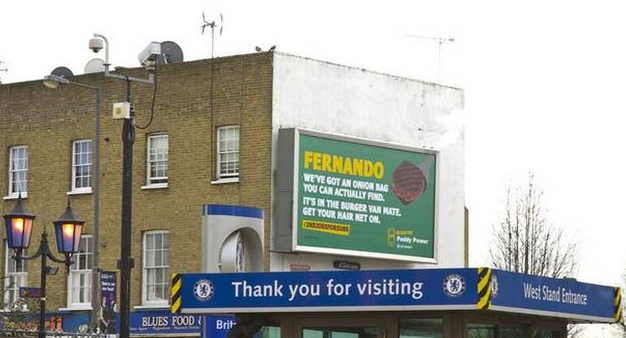 Giant poster mocking Torres is removed